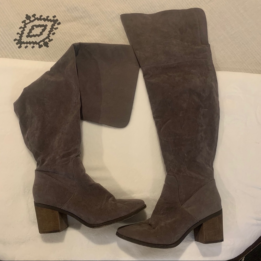 Thigh high heeled boots